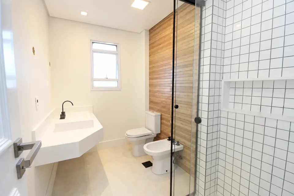 Bathroom with a vanity and glass-enclosed shower